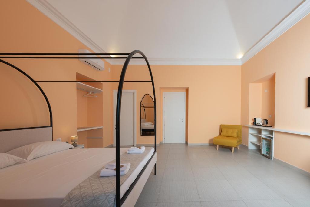 Postel nebo postele na pokoji v ubytování Aria Rooms