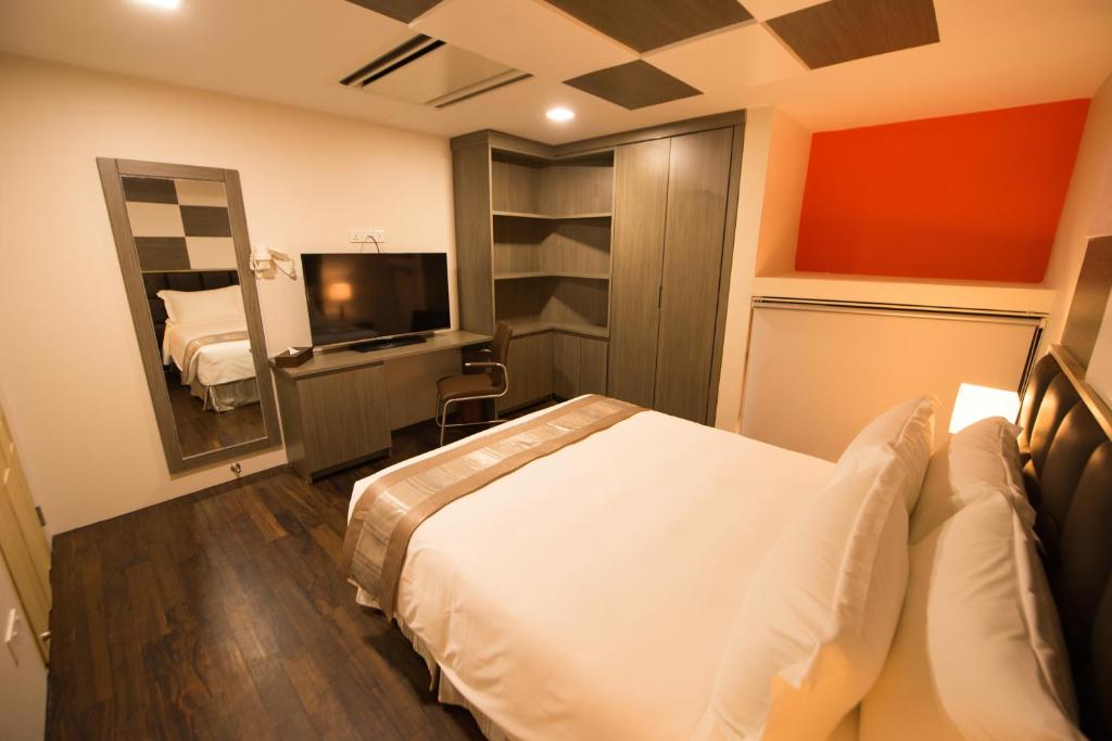 TV a/nebo společenská místnost v ubytování Hotel Parami