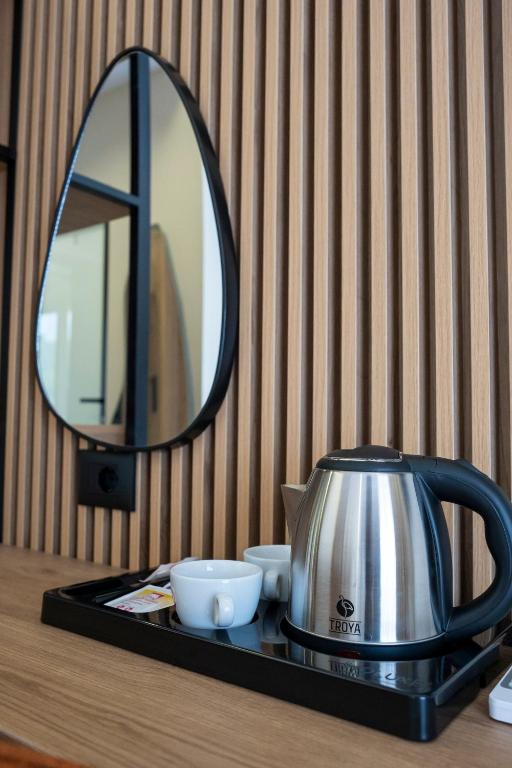 Příslušenství pro přípravu čaje a kávy v ubytování Rumar Hotel