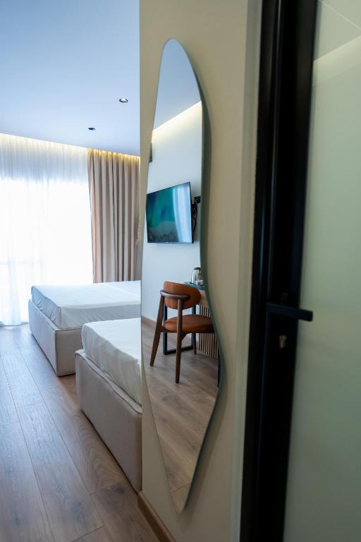 Postel nebo postele na pokoji v ubytování Rumar Hotel