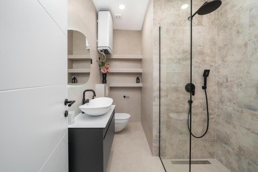 Koupelna v ubytování Apartmani Miranda