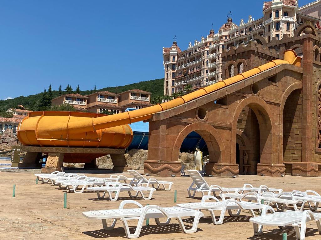 a large inflatable slide in front of a building at ASTORIA II Apartment 24 One Bedroom in Elenite