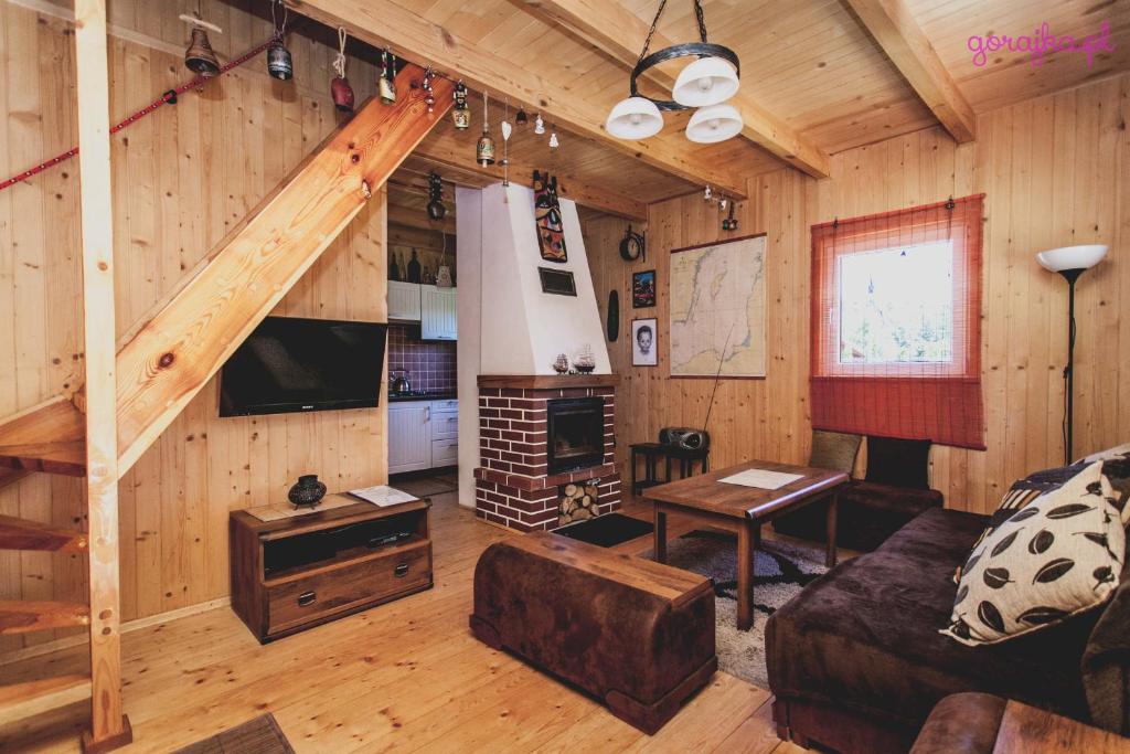 TV a/nebo společenská místnost v ubytování Domki Karaibskie