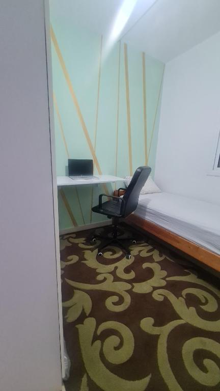Uma cama ou camas num quarto em appart near the Airport and beach Tanger gzenaya 2 rooms
