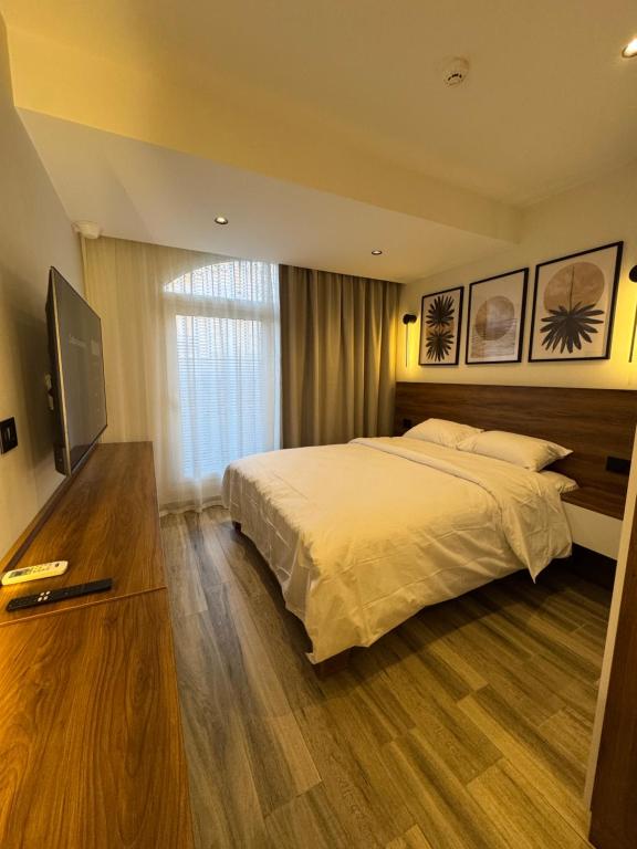 Postel nebo postele na pokoji v ubytování House 98 - Modern Boutique Stay in Zayed