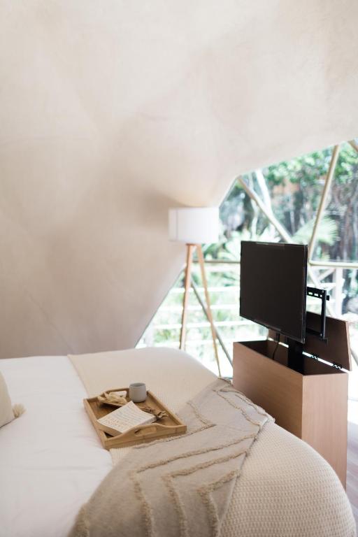 TV a/nebo společenská místnost v ubytování Alma Maya Resort - Riviera Maya