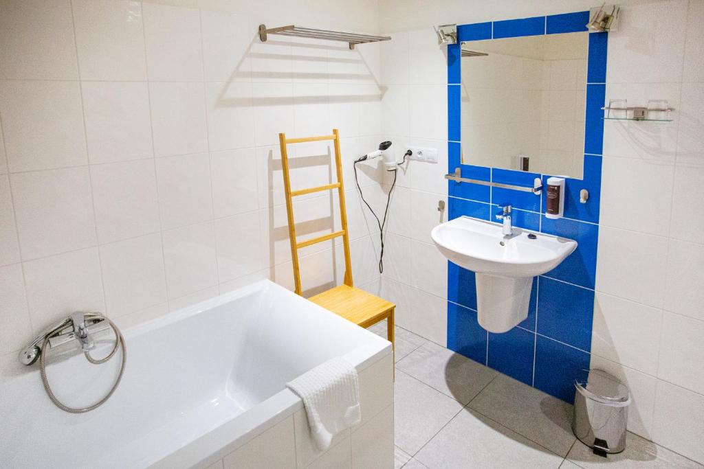 Koupelna v ubytování Hotel CHODOV ASC