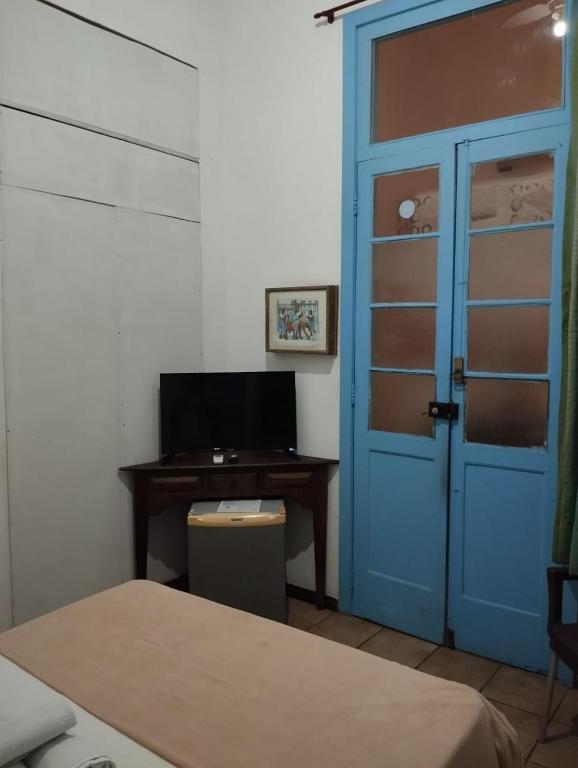 TV a/nebo společenská místnost v ubytování Bed & breakfast Villa Carmo