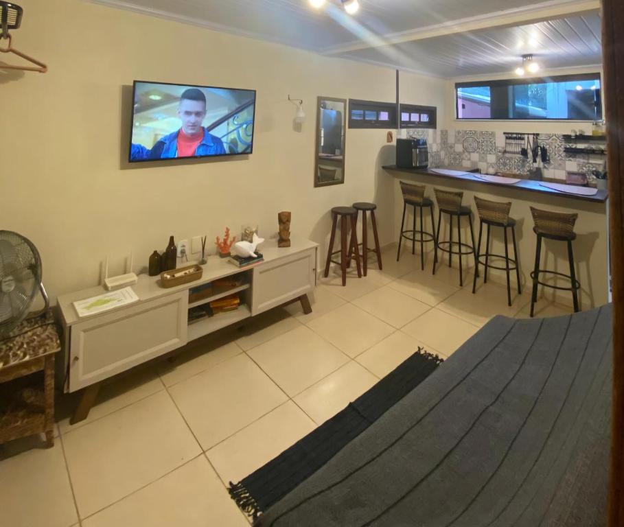 TV a/nebo společenská místnost v ubytování Casa inteira Ilha Grande