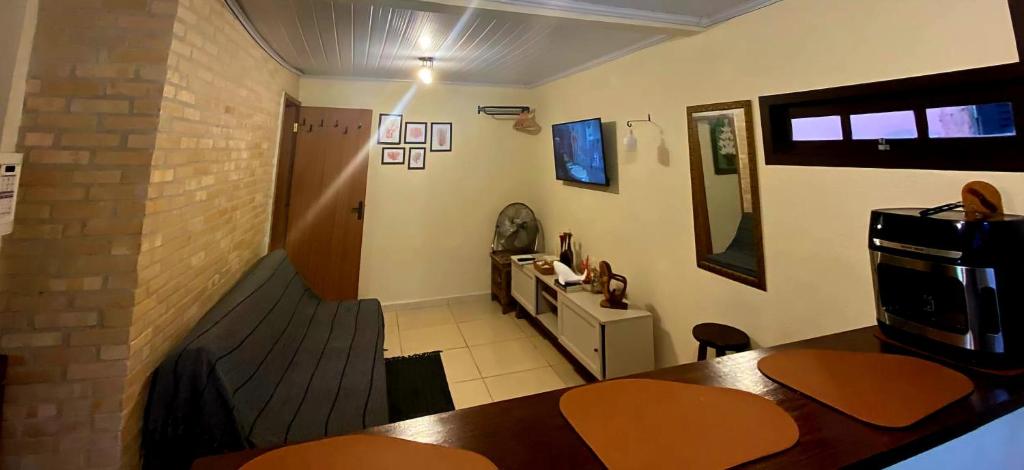 TV a/nebo společenská místnost v ubytování Casa inteira Ilha Grande