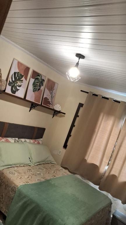 Postel nebo postele na pokoji v ubytování Casa inteira Ilha Grande