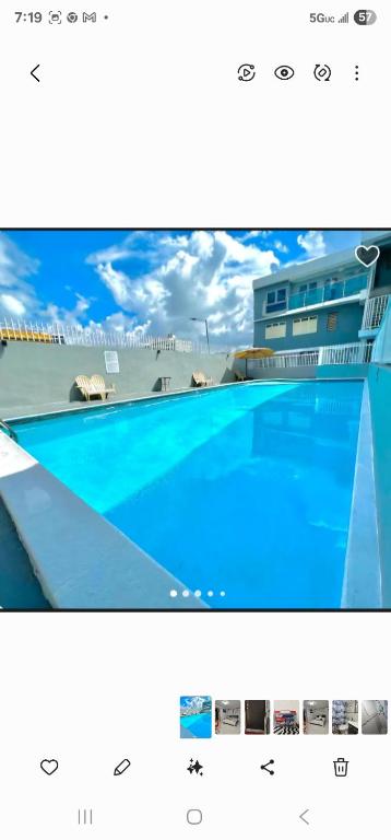 a screenshot of a picture of a swimming pool at Ocean pearl 2 in San Juan