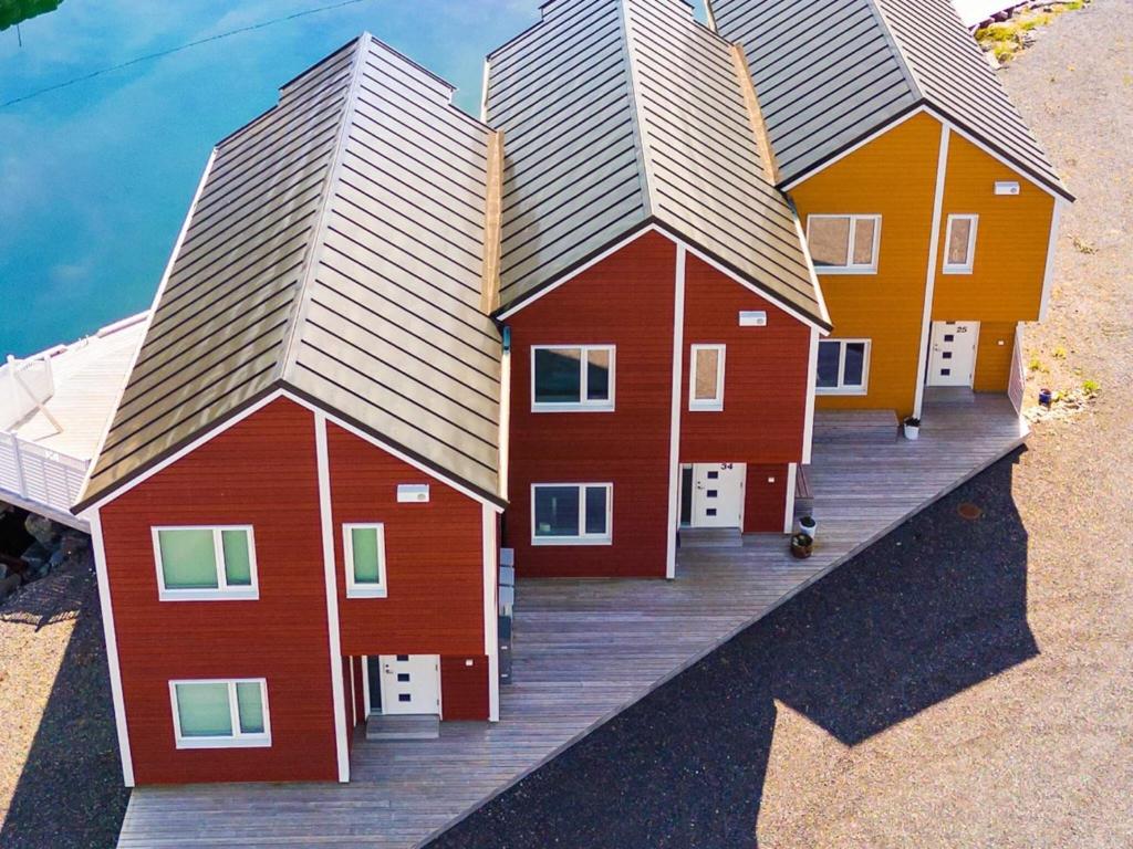 a model of a house with three roofs at 8 person holiday home in Sandøy in Finnøy