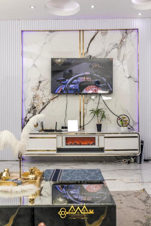 TV a/nebo společenská místnost v ubytování AM Apparts Suite Jacuzzi