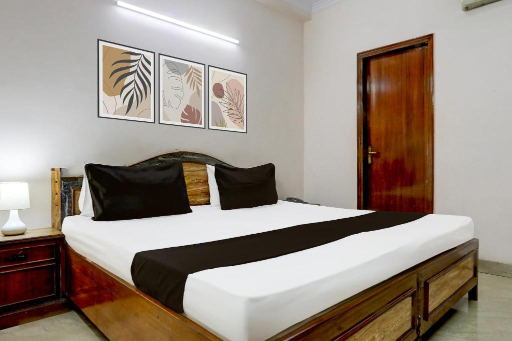 Postel nebo postele na pokoji v ubytování Hotel O Golden