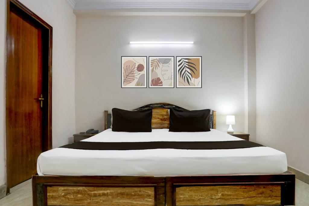 Postel nebo postele na pokoji v ubytování Hotel O Golden