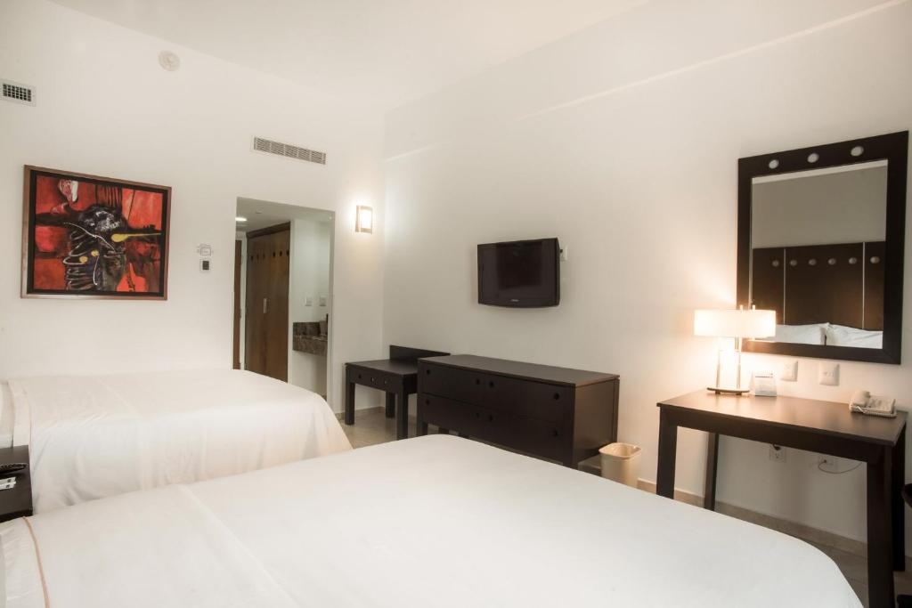Postel nebo postele na pokoji v ubytování Holiday Inn Express Tapachula by IHG