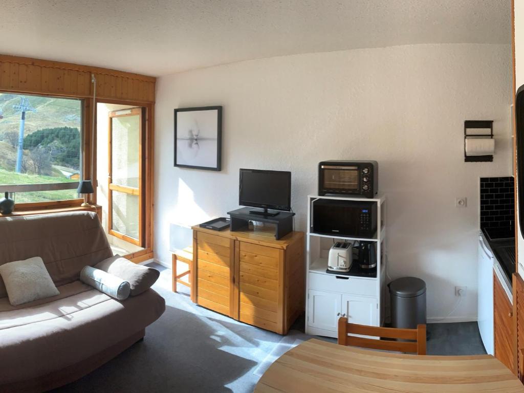 Chalet 24m², 4 pers, balcon sud, parking privatif, aux pieds des pistes Les Menuires - FR-1-344-1224