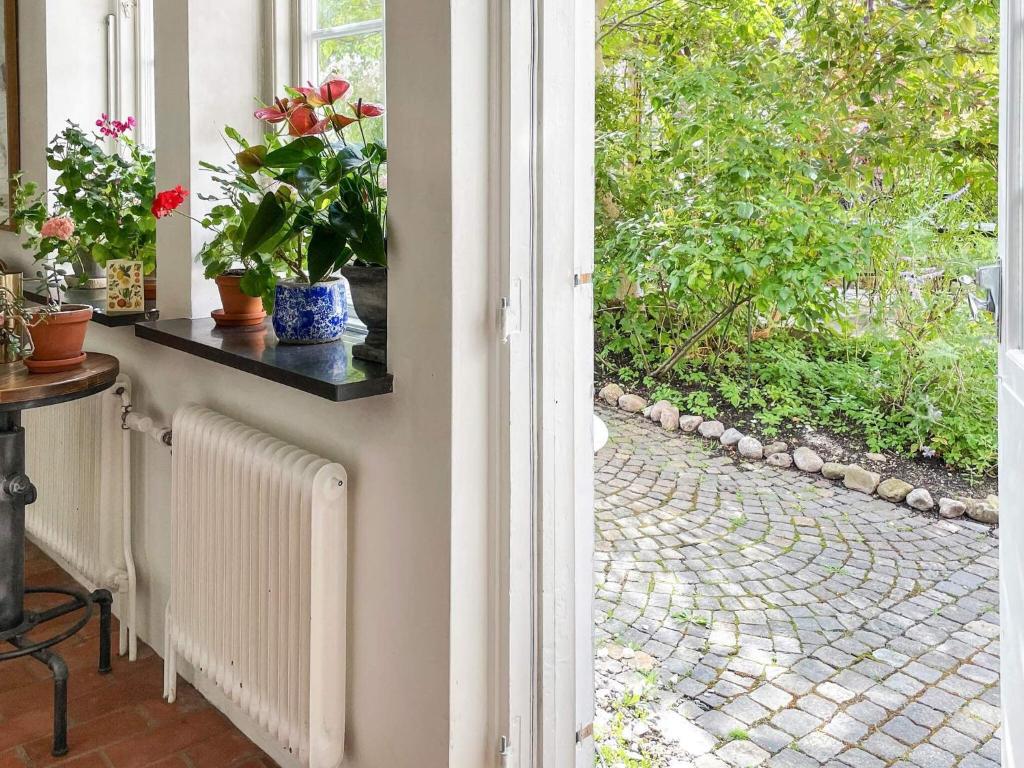 Aed väljaspool majutusasutust Holiday home SIMRISHAMN