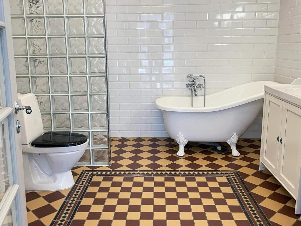 Vannituba majutusasutuses Holiday home SIMRISHAMN