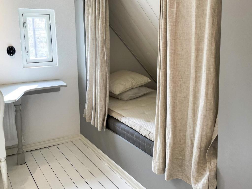 Voodi või voodid majutusasutuse Holiday home SIMRISHAMN toas
