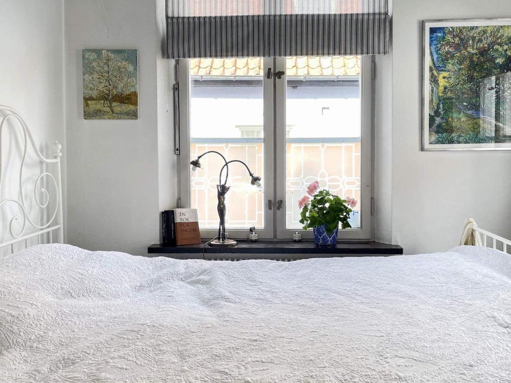 Voodi või voodid majutusasutuse Holiday home SIMRISHAMN toas
