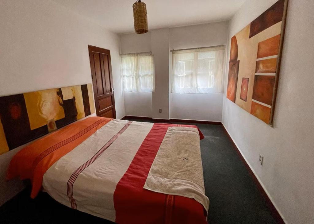 Postel nebo postele na pokoji v ubytování Casa Madero Rooms
