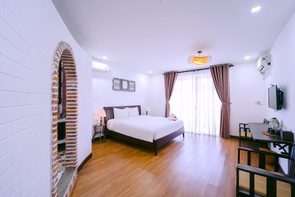 Phòng Deluxe Giường Đôi Có Ban Công