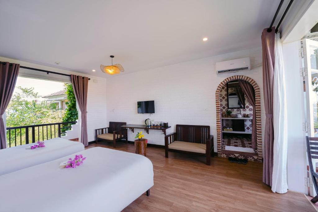 Phòng Deluxe Giường Đôi Có Ban Công