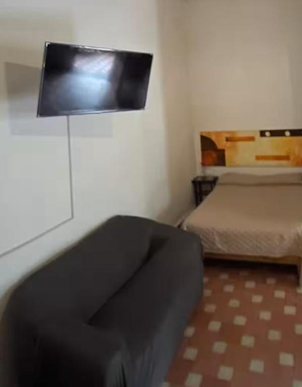 Postel nebo postele na pokoji v ubytování Casa Madero Rooms