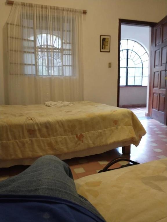 Postel nebo postele na pokoji v ubytování Casa Madero Rooms