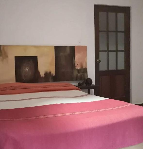 Postel nebo postele na pokoji v ubytování Casa Madero Rooms