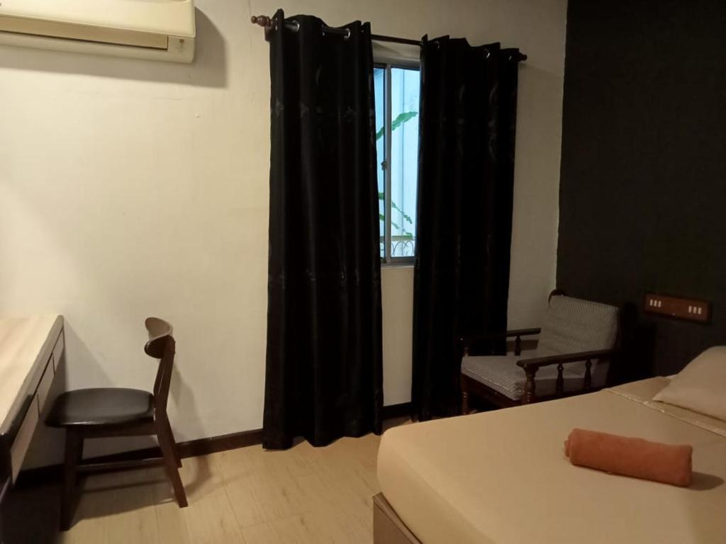 Postel nebo postele na pokoji v ubytování Fata Hotel by Project Borneo