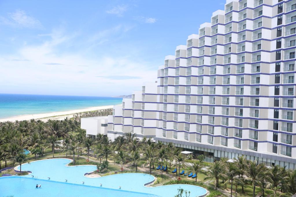 an aerial view of the trump ocean club hotel at Arena Seaview Apartment - Cam Ranh Resort in Cam Ranh International Airport