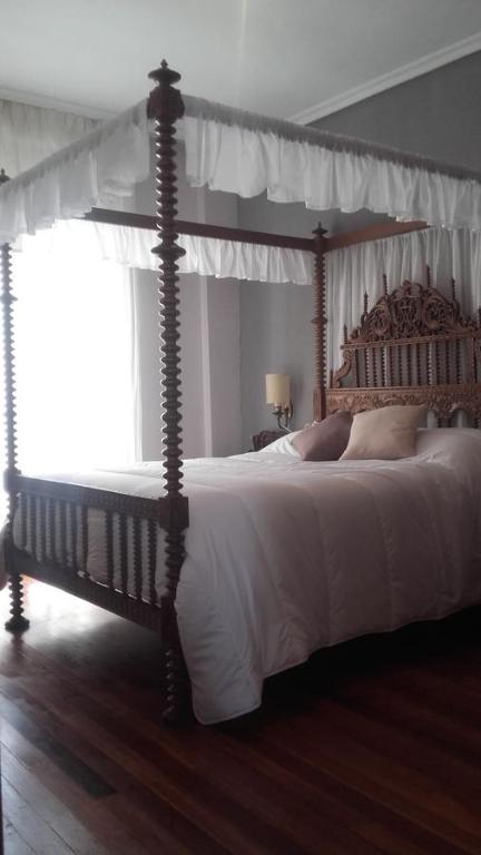 Кровать или кровати в номере Casa Turistica Termas aparcamiento y desayuno incluido