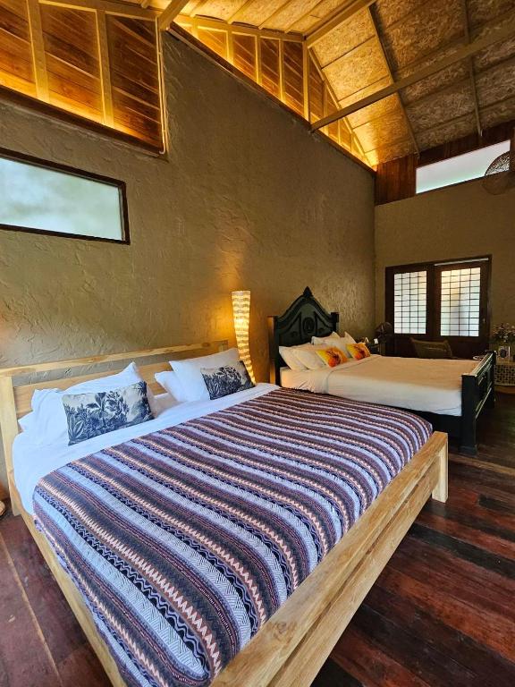 Postel nebo postele na pokoji v ubytování Kiri Vari Boutique Resort at Sapan