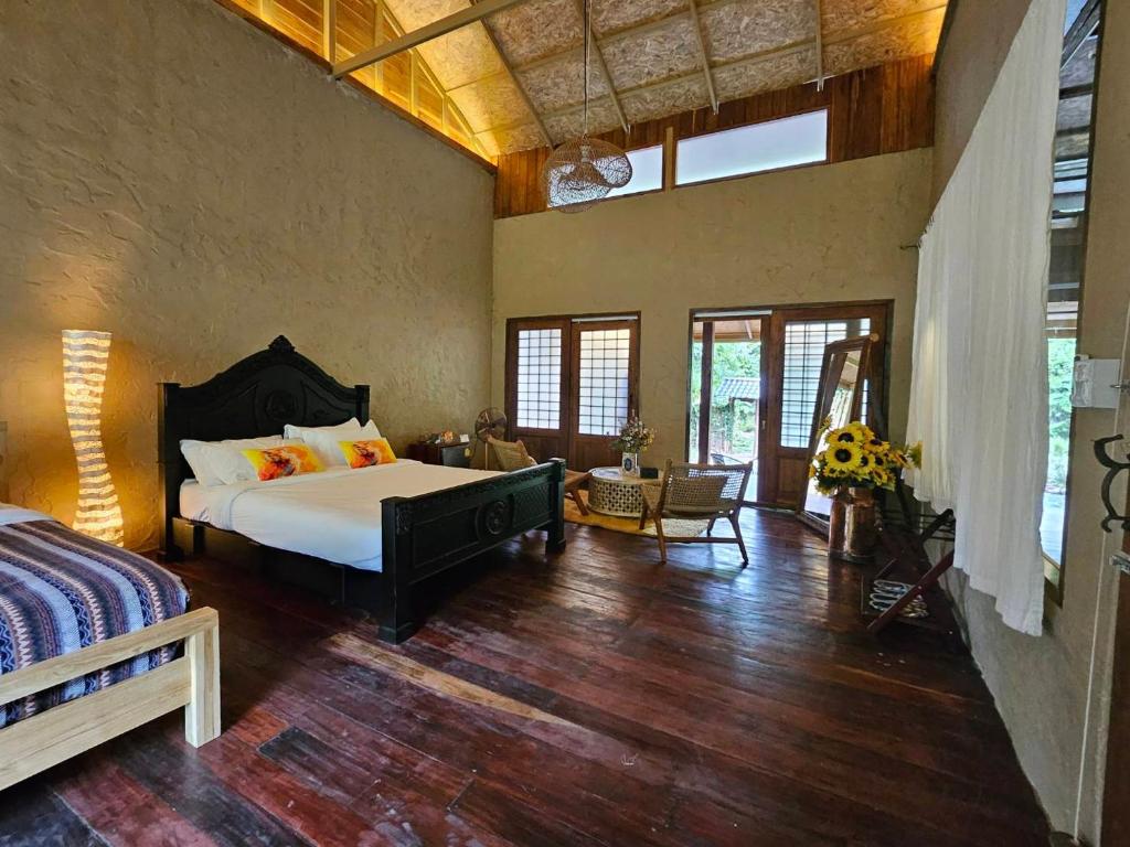 Postel nebo postele na pokoji v ubytování Kiri Vari Boutique Resort at Sapan