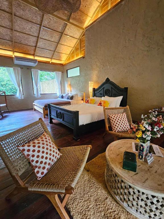 Postel nebo postele na pokoji v ubytování Kiri Vari Boutique Resort at Sapan