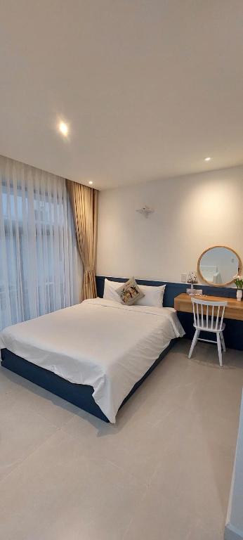 Postel nebo postele na pokoji v ubytování Hue House Stay Gần Aeon Mall Huế