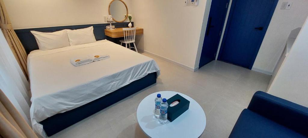 Postel nebo postele na pokoji v ubytování Hue House Stay Gần Aeon Mall Huế