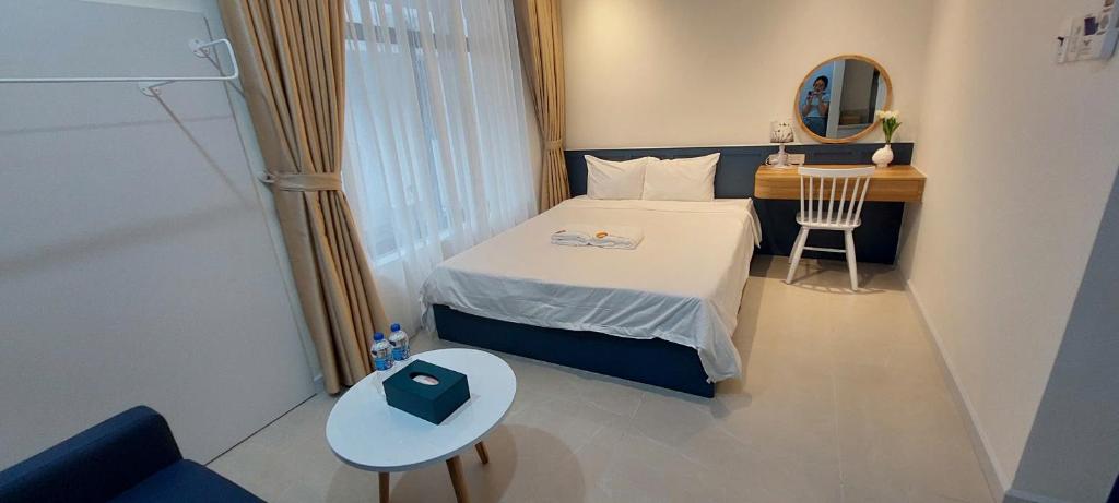 Postel nebo postele na pokoji v ubytování Hue House Stay Gần Aeon Mall Huế