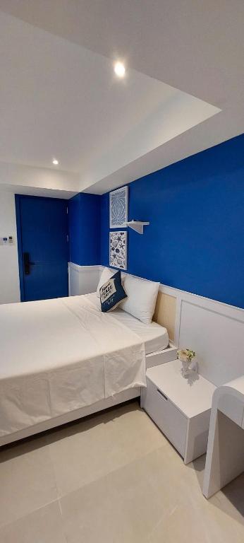 Postel nebo postele na pokoji v ubytování Hue House Stay Gần Aeon Mall Huế