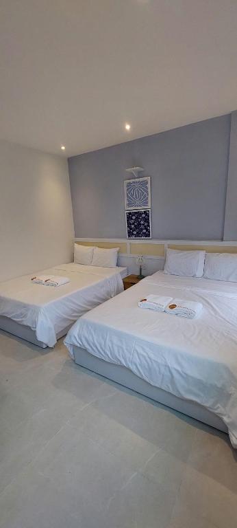 Postel nebo postele na pokoji v ubytování Hue House Stay Gần Aeon Mall Huế