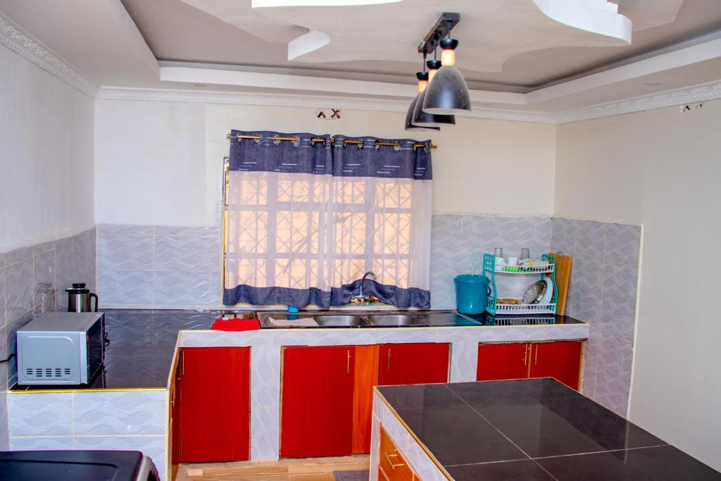Kuchyň nebo kuchyňský kout v ubytování Mellan Country Home