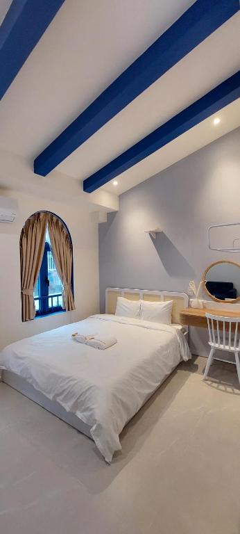 Postel nebo postele na pokoji v ubytování Hue House Stay Gần Aeon Mall Huế