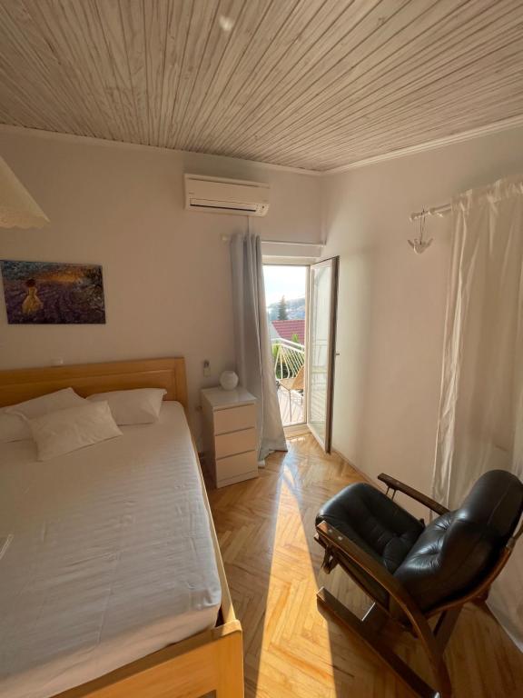 Postel nebo postele na pokoji v ubytování Apartment and rooms Jurišić
