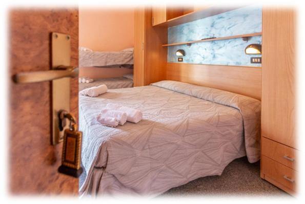 Postel nebo postele na pokoji v ubytování Hotel Colibri B&B