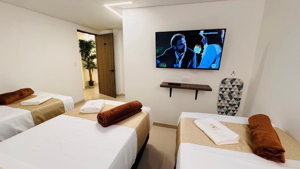 Postel nebo postele na pokoji v ubytování Hotel Jelt Aeropuerto