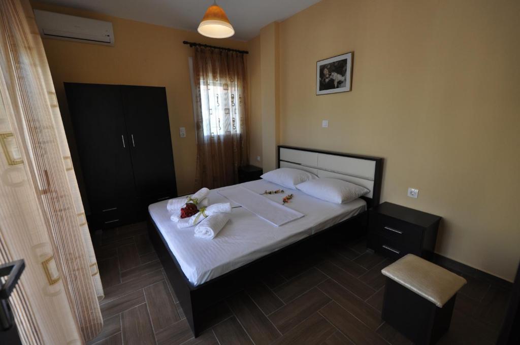 Łóżko lub łóżka w pokoju w obiekcie Villa Kaiti