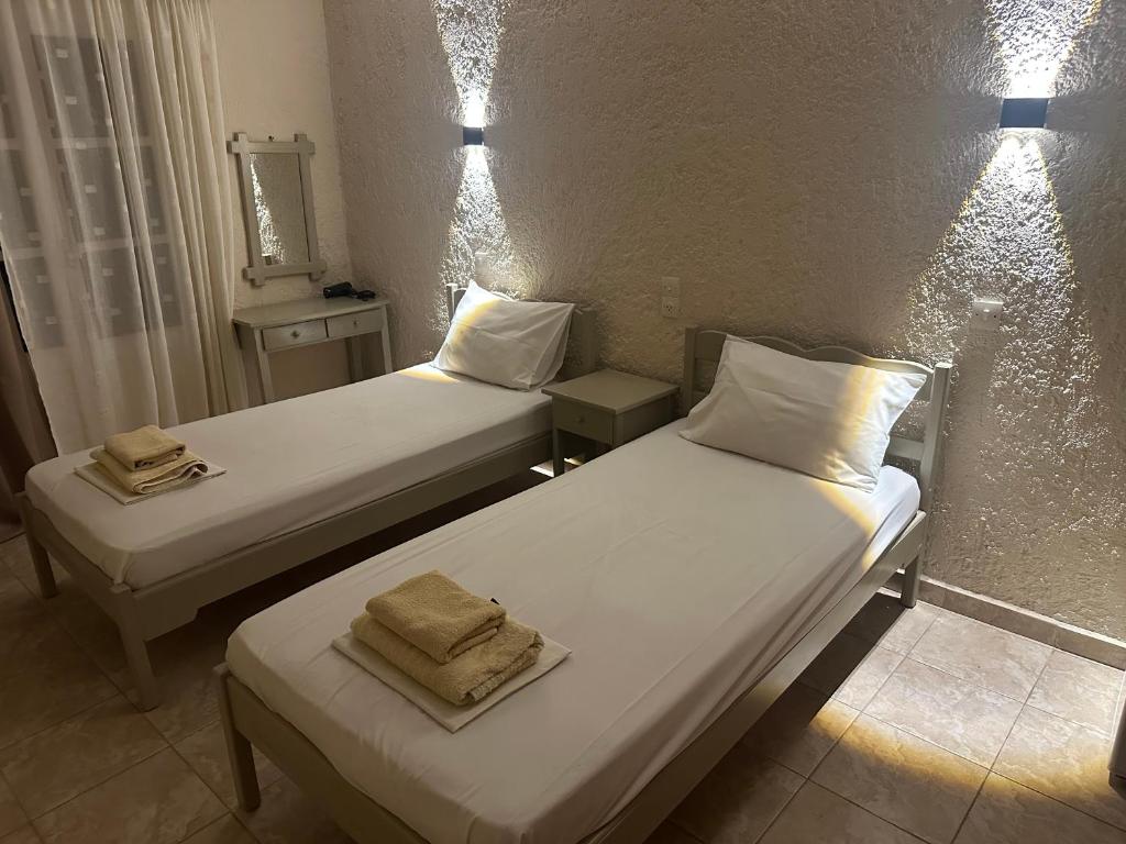 Postel nebo postele na pokoji v ubytování Mary Popi